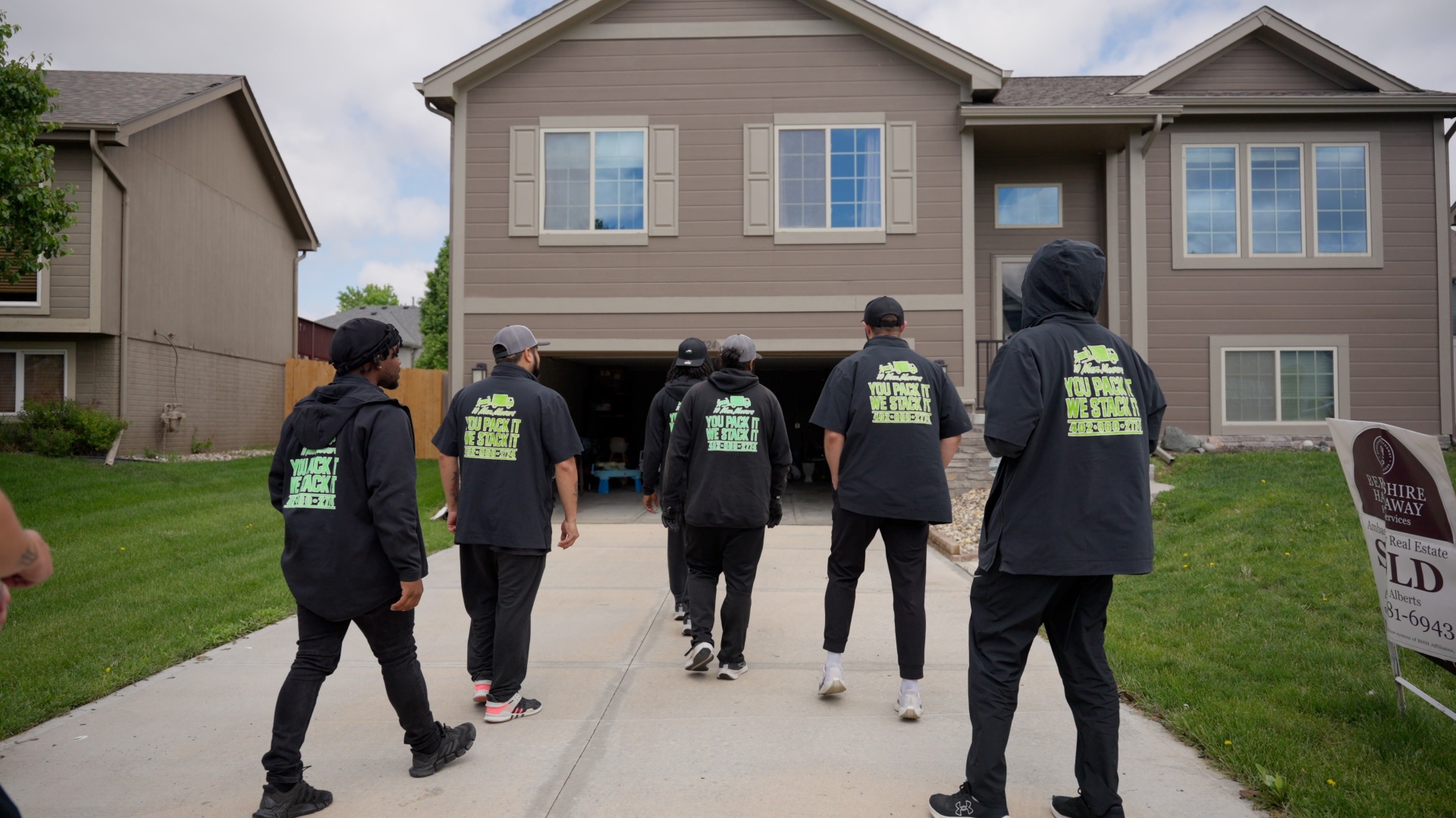 Moving crew walking to customer's home