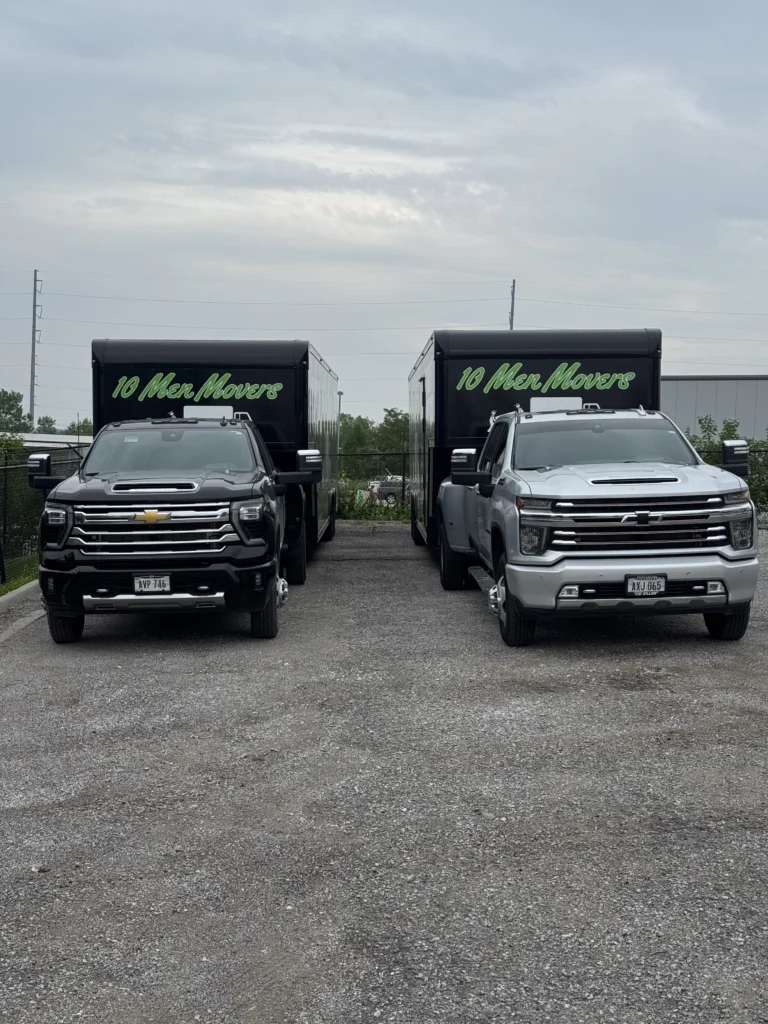 10 Men Movers branded trucks parked and ready for dispatch. Showcasing a trusted Omaha company known for professional moving services. office movers Omaha
